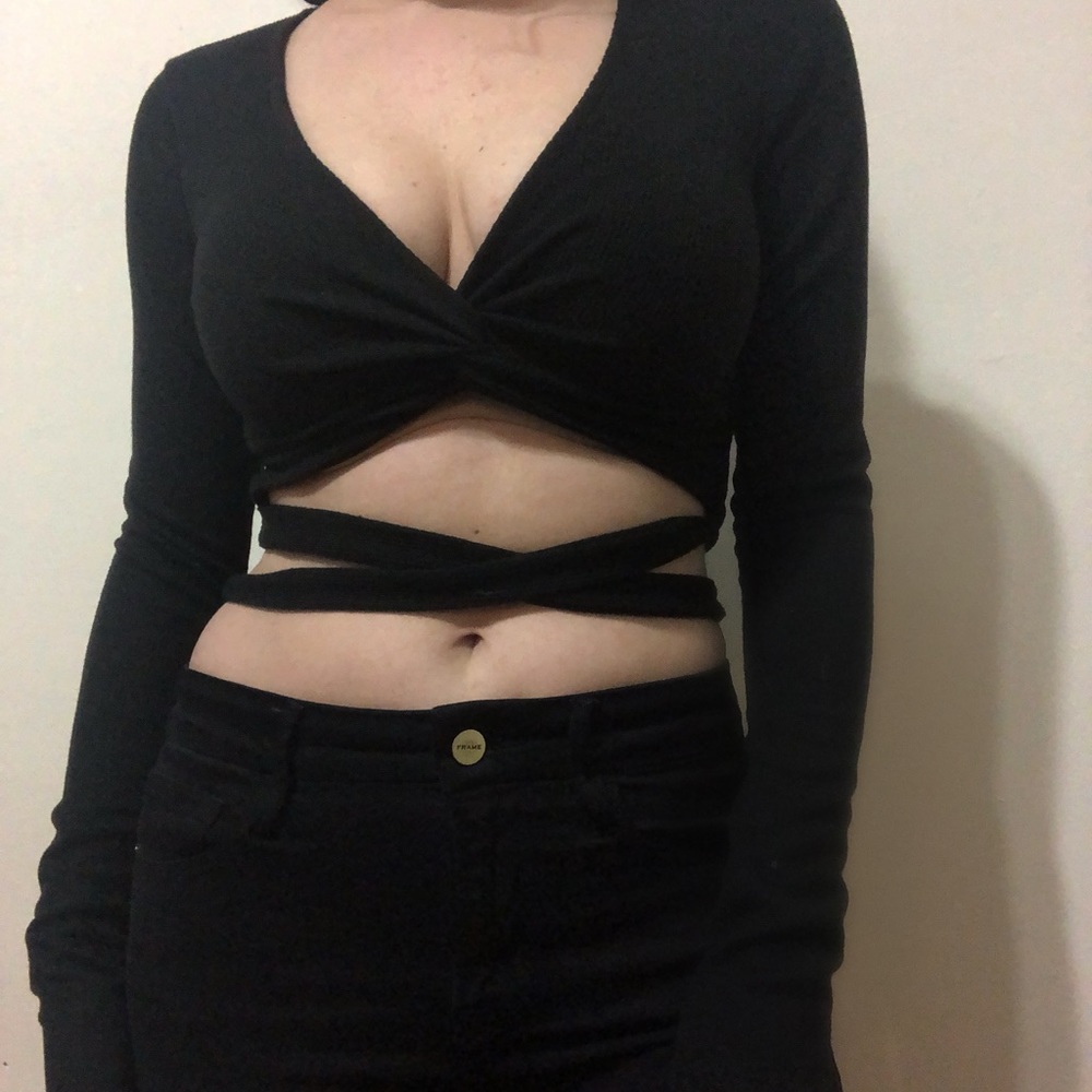 Black ultra cropped Urban Outfitters long sleeve wrap top.